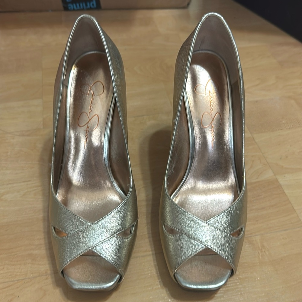 Gold open toe pumps